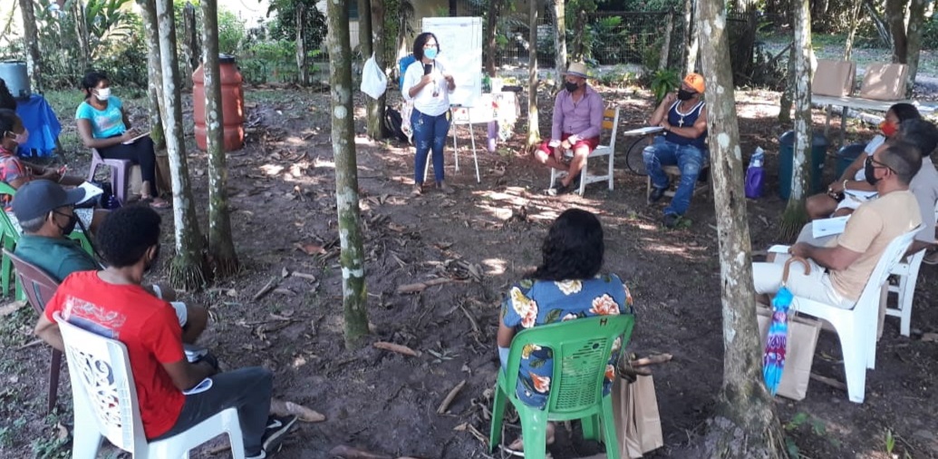a group of people sitting in chairs