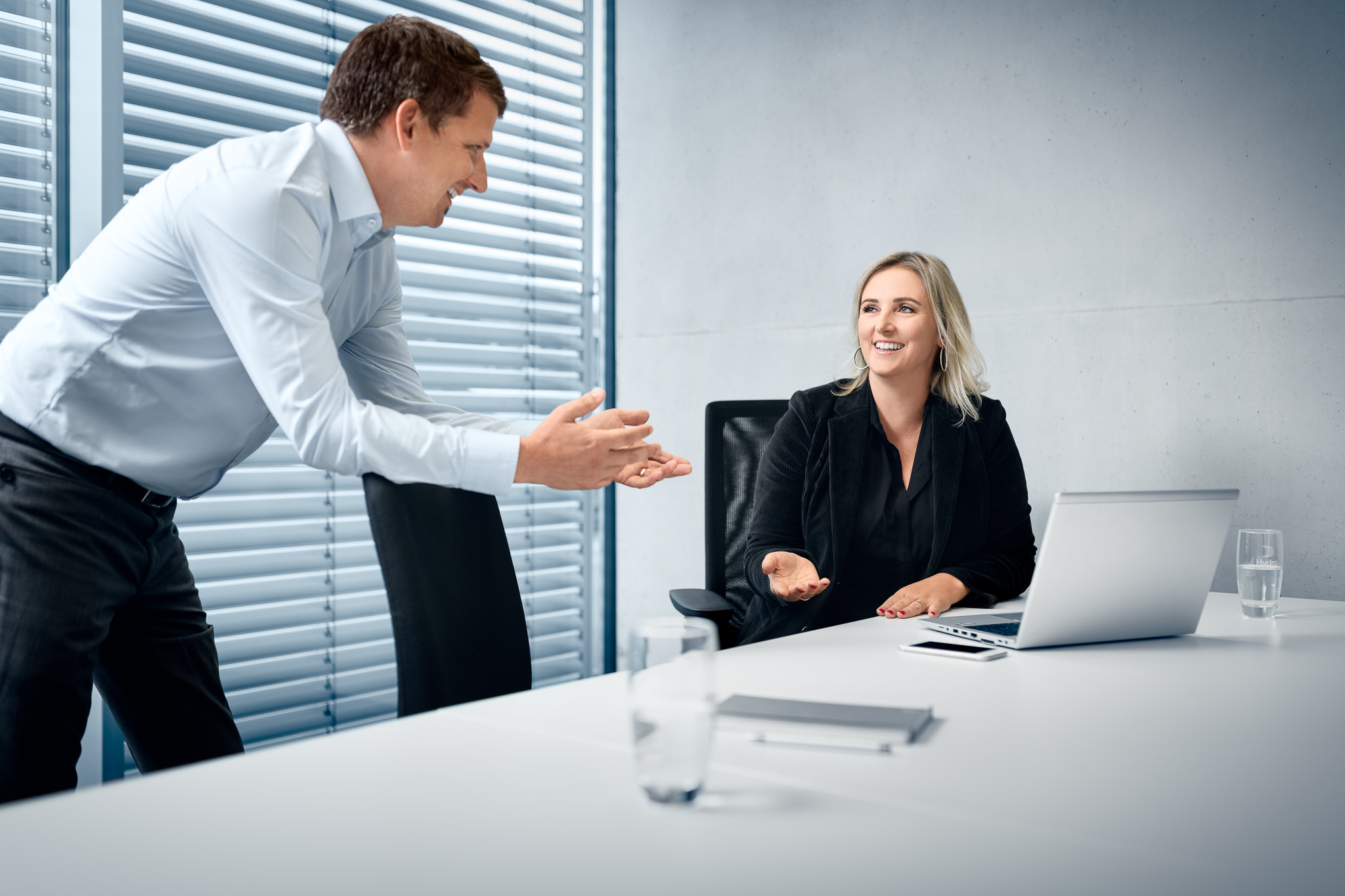 a man and a woman shaking hands