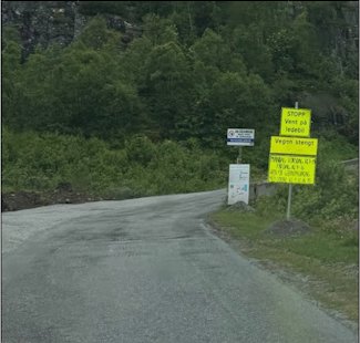 a road with signs on it