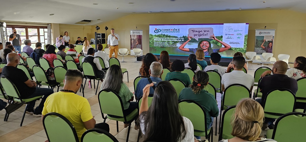 a group of people sitting in a room
