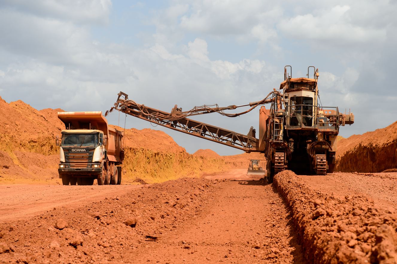 a construction vehicle on a dirt road