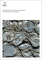 Front page of white paper Hydro Circular Economy Lifecycle Assessment June 2020. Aluminium beverage cans about to be recycled.