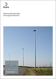 Publication cover with photo of three tall light poles roadside