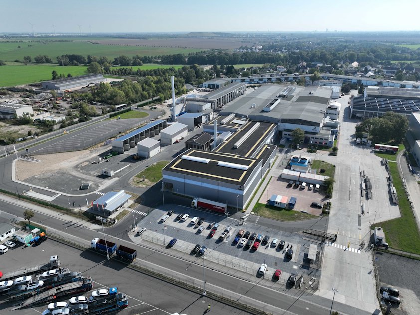 a factory and a parking lot