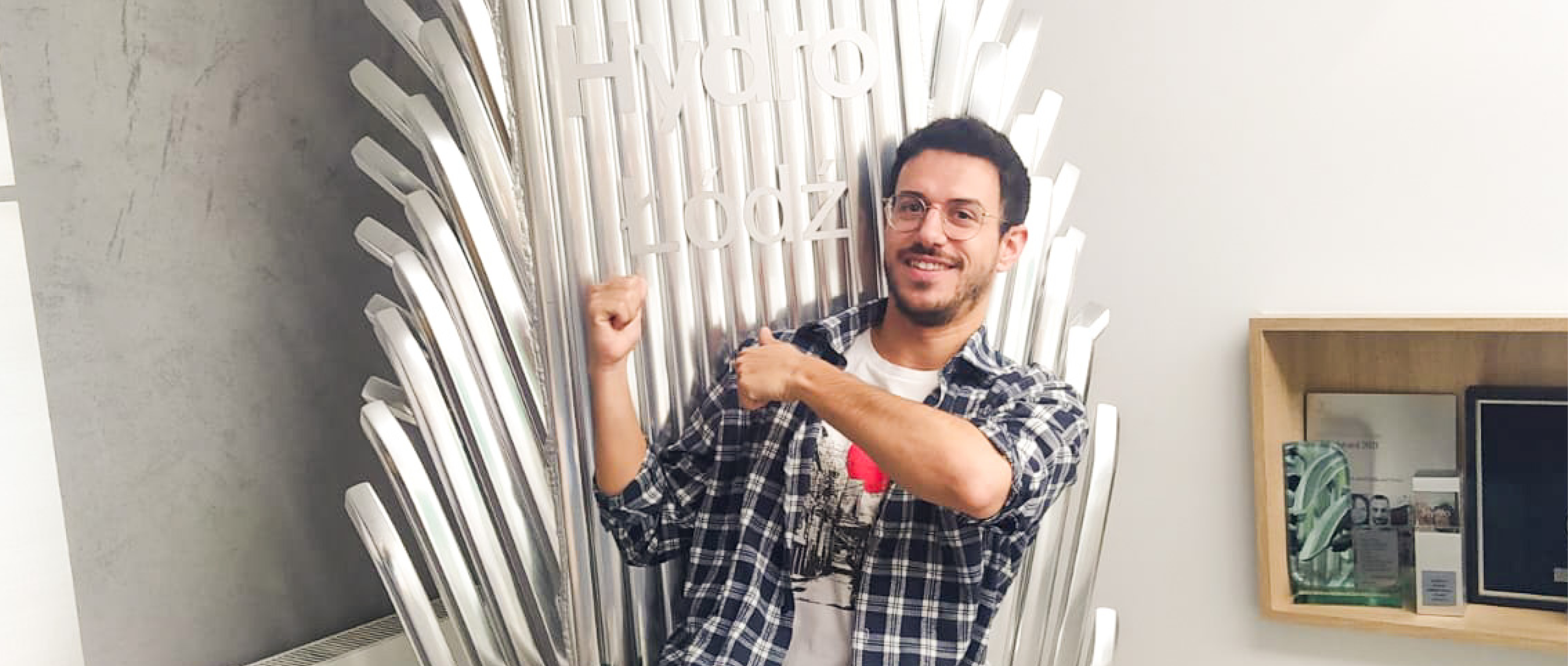 a man holding a door frame